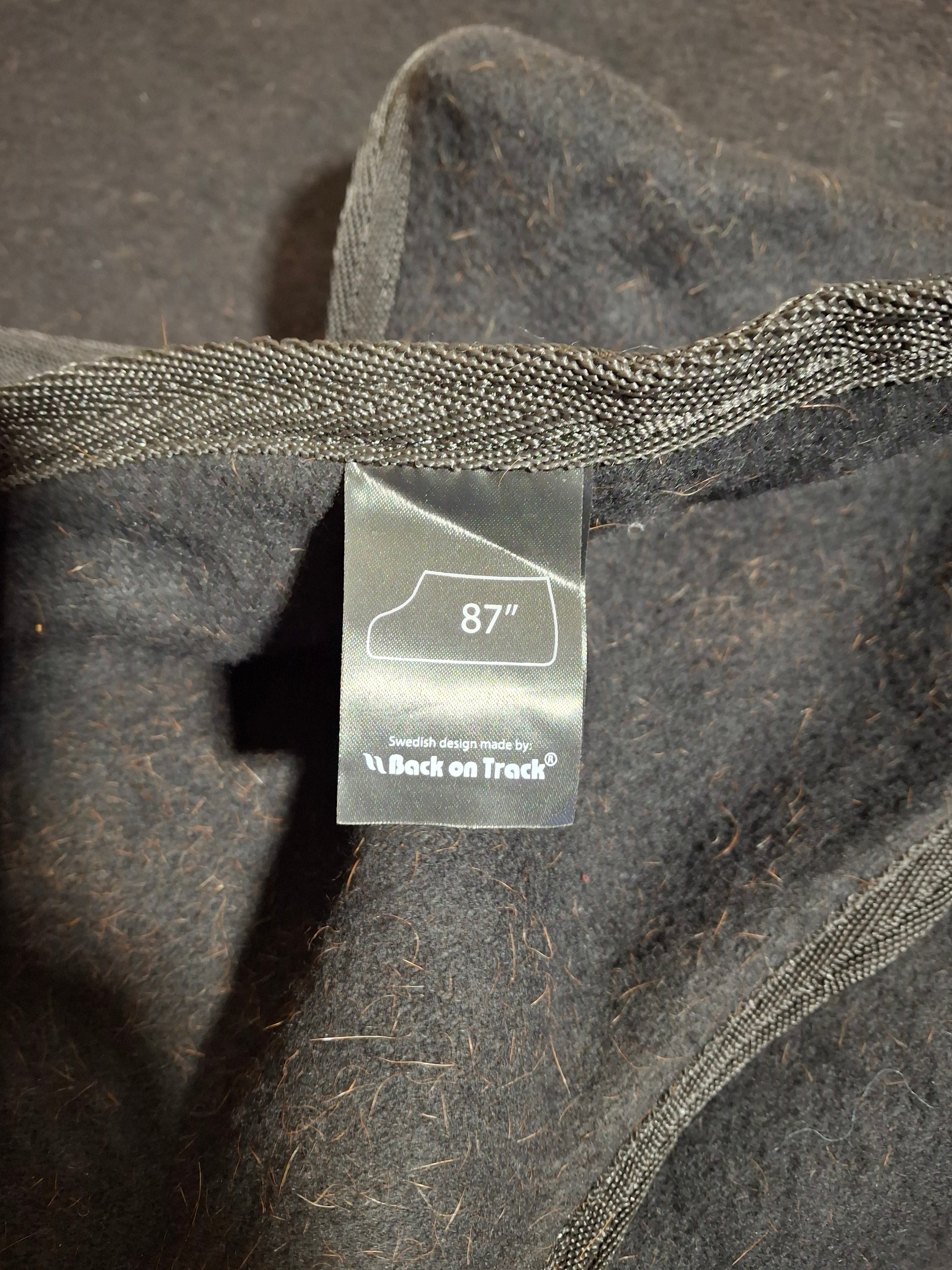 Used 87" Back on Track William Wool Exercise Rug